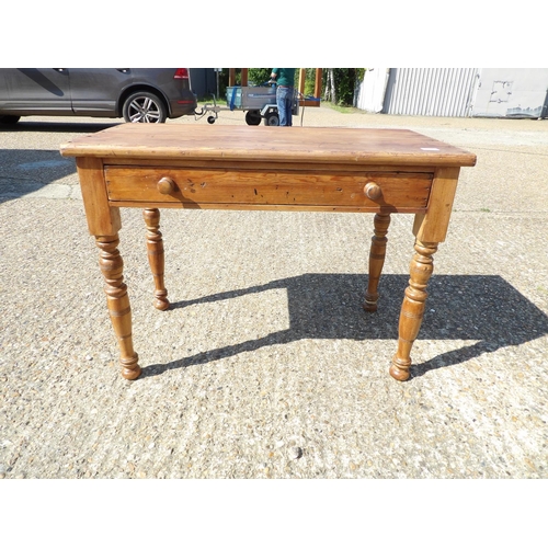 154 - A country pine single drawer side table