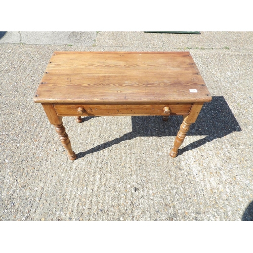 154 - A country pine single drawer side table