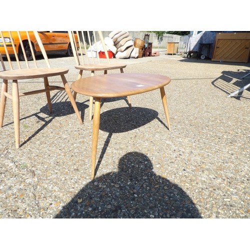 156 - A pair of ercol chairs together with large pebble occasional table