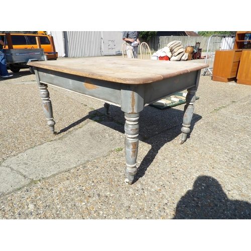 157 - A blue painted pine kitchen table