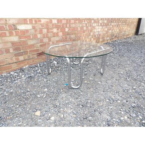 16 - A chrome coffee table with circular glass top 93c, diameter