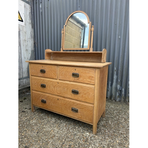 160 - An original light oak dressing chest of four drawers by HEALS 107x48x77