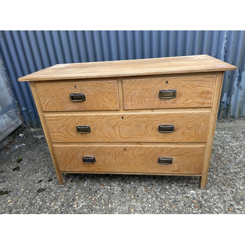 160 - An original light oak dressing chest of four drawers by HEALS 107x48x77