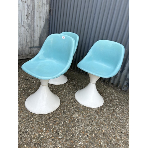 162 - A set of three blue and white plastic tub chairs