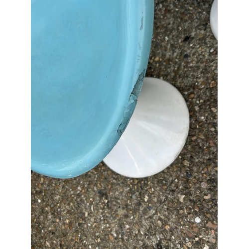 162 - A set of three blue and white plastic tub chairs