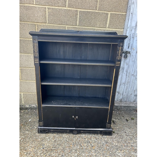 168 - An Edwardian ebonised open fronted bookcase 108x38x130