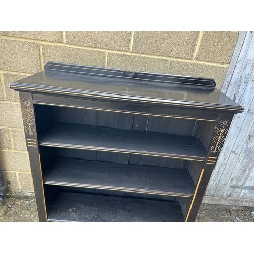 168 - An Edwardian ebonised open fronted bookcase 108x38x130