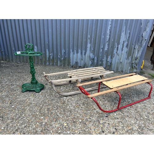 170 - Two vintage sledges and a green painted iron hall stand