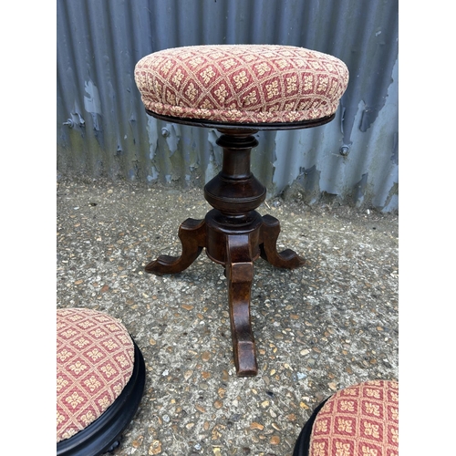 175 - A Victorian swivel piano stool together with two small footstools