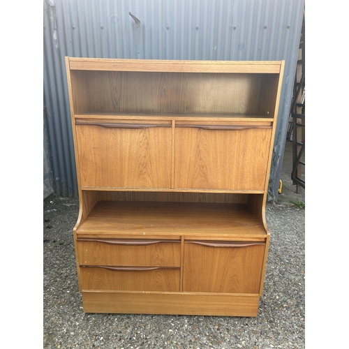 184 - A mid century teak high back lounge unit 105x30x137