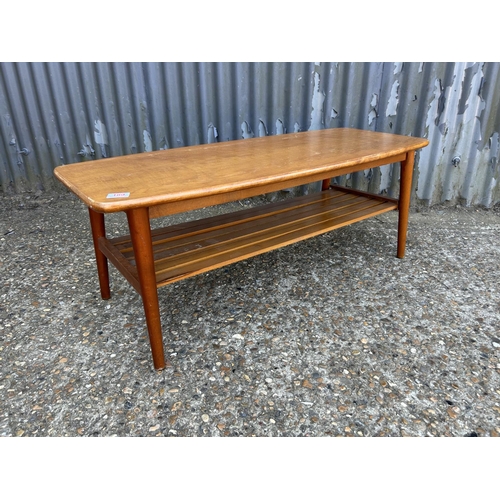 189 - A retro teak coffee table