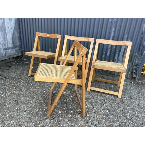 190 - A set of four folding chairs with begere seats