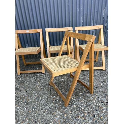 190 - A set of four folding chairs with begere seats