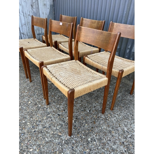 192 - A set of six danish style teak dining chairs with rush seats (some af)