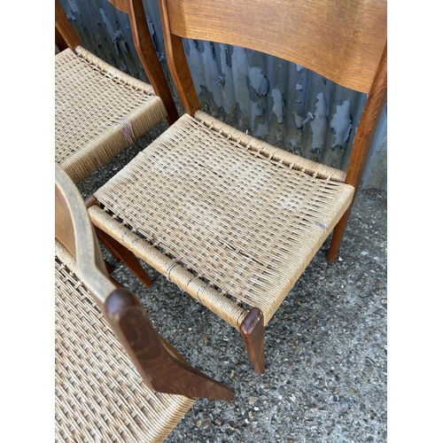 192 - A set of six danish style teak dining chairs with rush seats (some af)