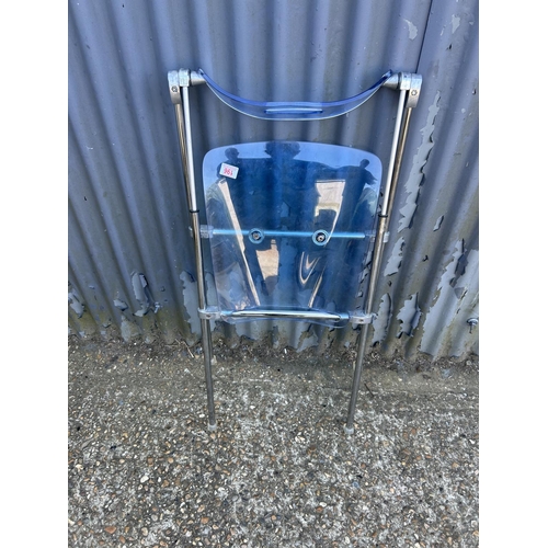 196 - A designer blue Perspex and steel folding chair