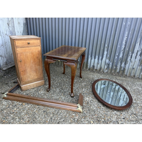 200 - Mahogany table, pine bedside, mirror and copper fender