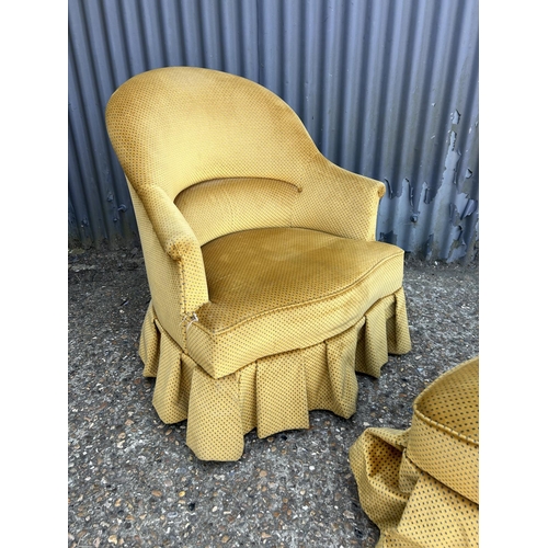 202 - A gold upholstered bedroom chair with matching footstool