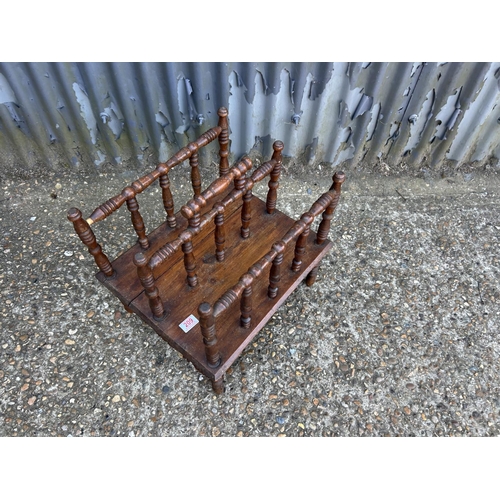 209 - A small oak newspaper rack