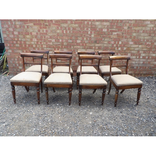 21 - A set of 8 Victorian mahogany bar back dining chairs with striped drop in seats