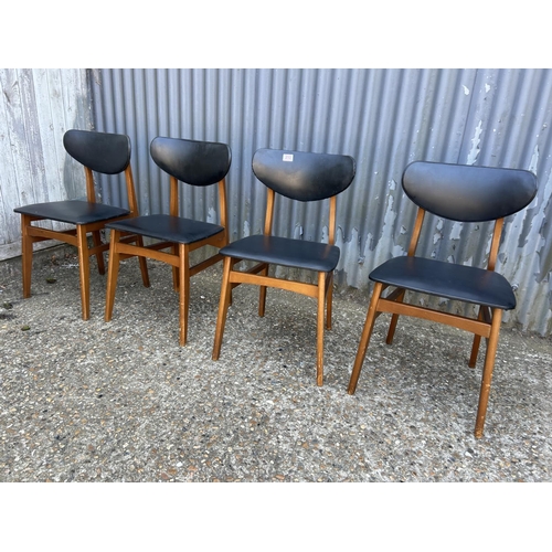 213 - Four mid century teak chairs