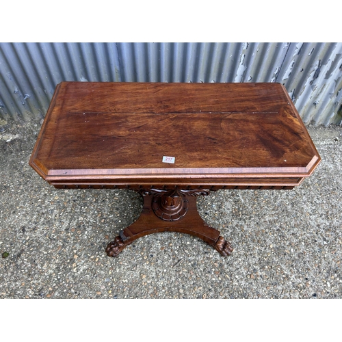 217 - A Victorian mahogany card table with fold over top and blue baize surface