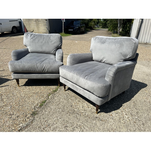 219 - A pair of good quality modern grey unholstered armchairs