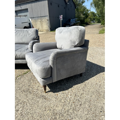 219 - A pair of good quality modern grey unholstered armchairs