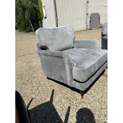 219 - A pair of good quality modern grey unholstered armchairs