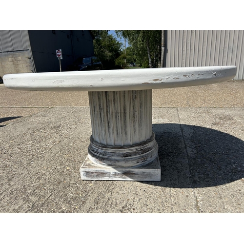 221 - A large white circular dining table on thick painted pedestal base 148cm diameter