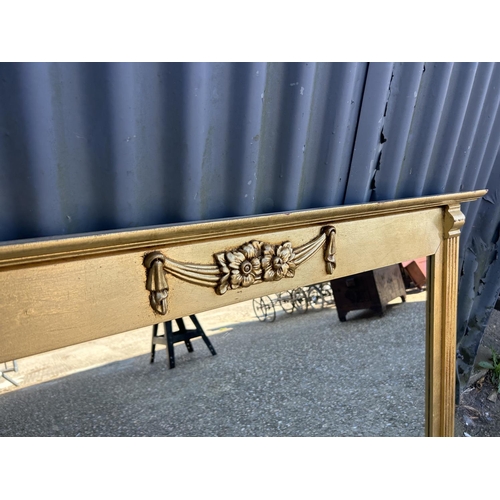 225 - A gold gilt overmantel mirror 102x75