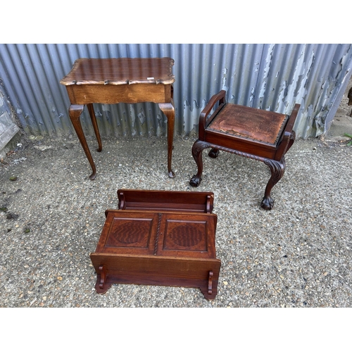 233 - A mahogany wall cabinet, table and  piano stool