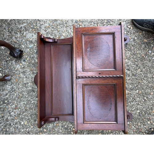 233 - A mahogany wall cabinet, table and  piano stool