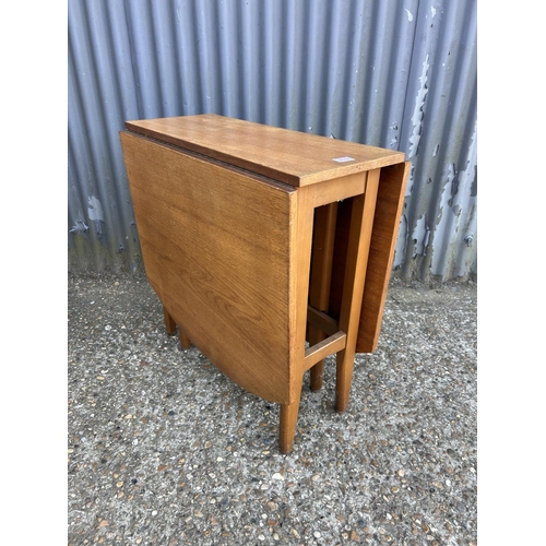 235 - A teak gate-leg table