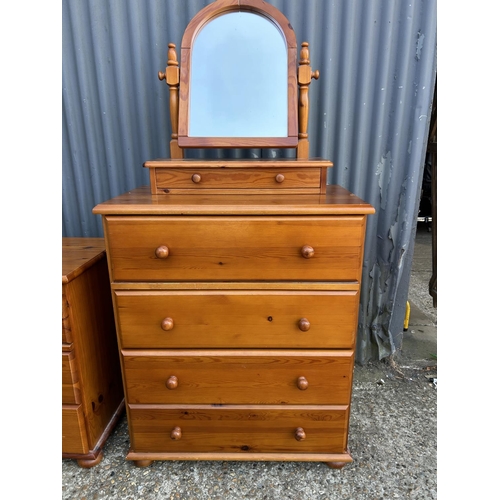 247 - A pine chest of four drawers together with bedside and swing mirror