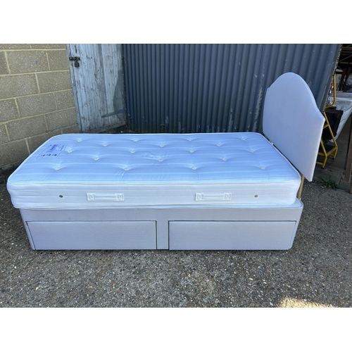 253 - A modern grey two drawer single divan bed with Nestledown mattress (hardly used)