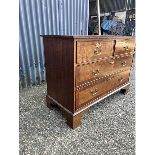 254 - A Georgian oak chest of four drawers 110x50x80