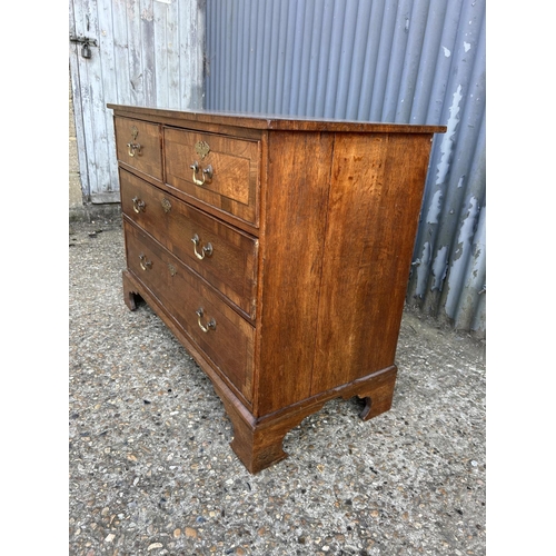 254 - A Georgian oak chest of four drawers 110x50x80