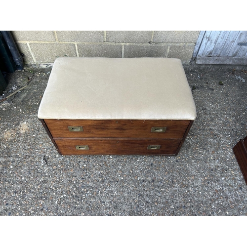 256 - A Victorian two drawer military style chest of two with upholstered cushion top 92x54x54