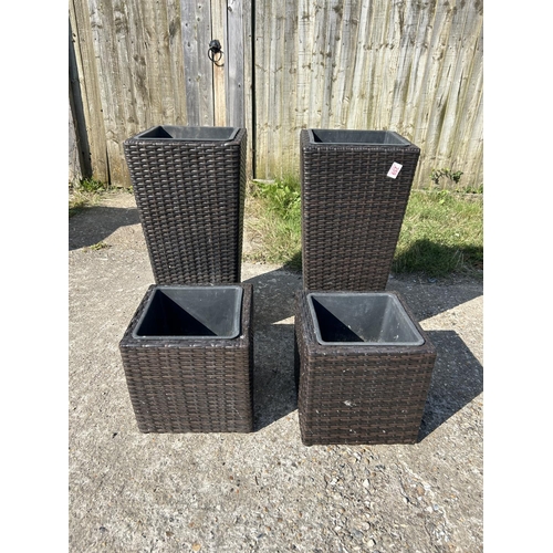 259 - A set of four rattan style planters