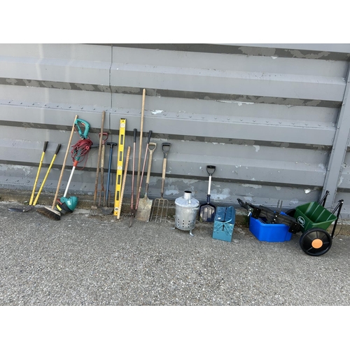 260 - A collection of garden tools including spreader, toolbox, incinerator and hand tools