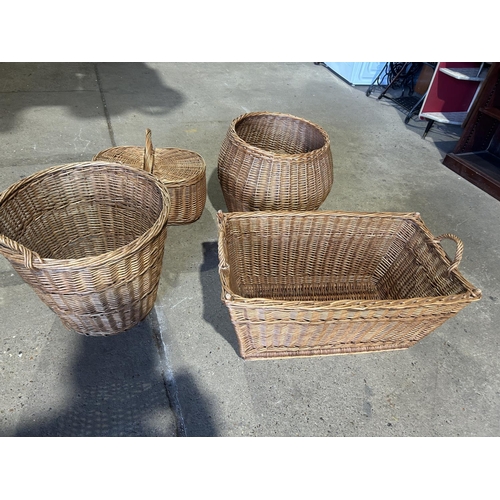 262 - Four large wicker baskets and three small pieces of basketware