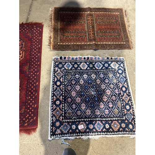 263 - Three small oriental  pattern rugs