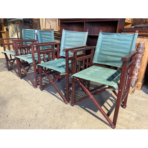 267 - Four folding directors style chairs