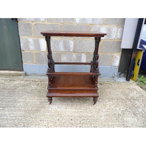 28 - A Victorian walnut whatnot with drawer