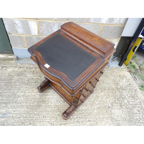 29 - An inlaid walnut davenport desk