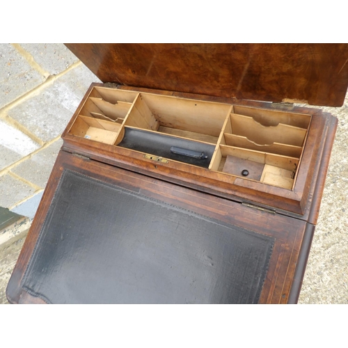 29 - An inlaid walnut davenport desk