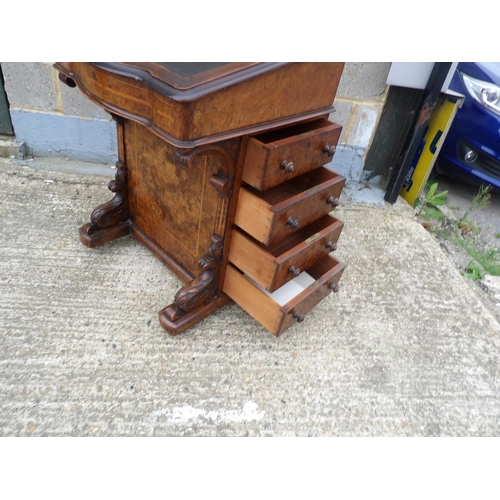 29 - An inlaid walnut davenport desk