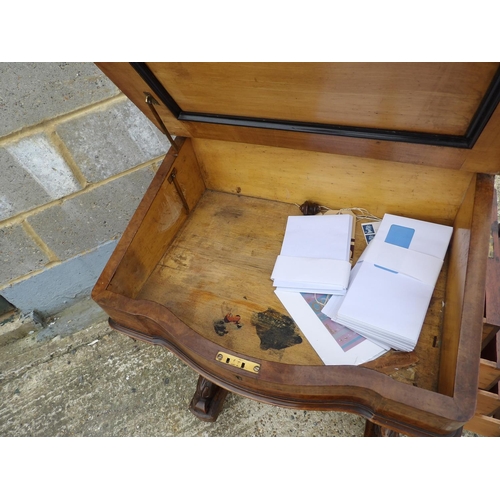 29 - An inlaid walnut davenport desk