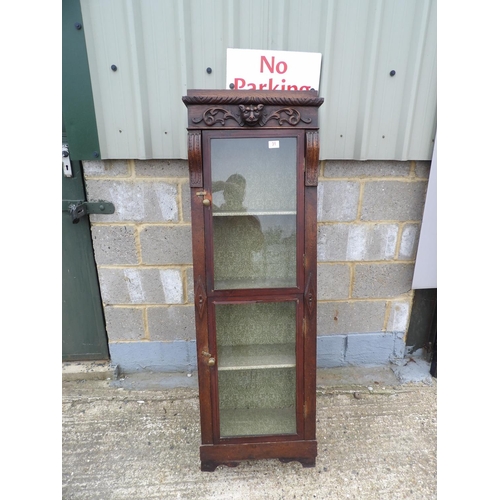 31 - Carved oak two door cabinet 48x27x155